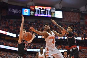 Point guard John Gillon drove to the hoop as time wound down to give Syracuse a regulation victory, but he lost the handle and the ball rolled o